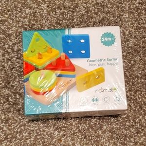 5/$30 BNIB sealed geometric wooden sorting toy